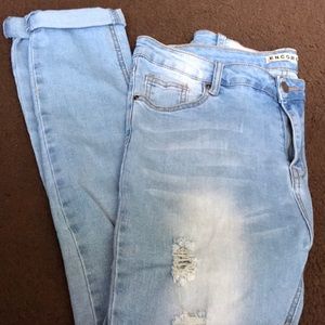 Light washed skinny jeans w/ subtle rips for style